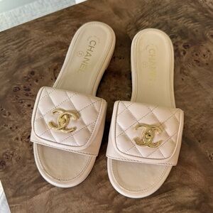 CHANEL Quilted Leather Slide Mules in Pale Pink with Gold CC